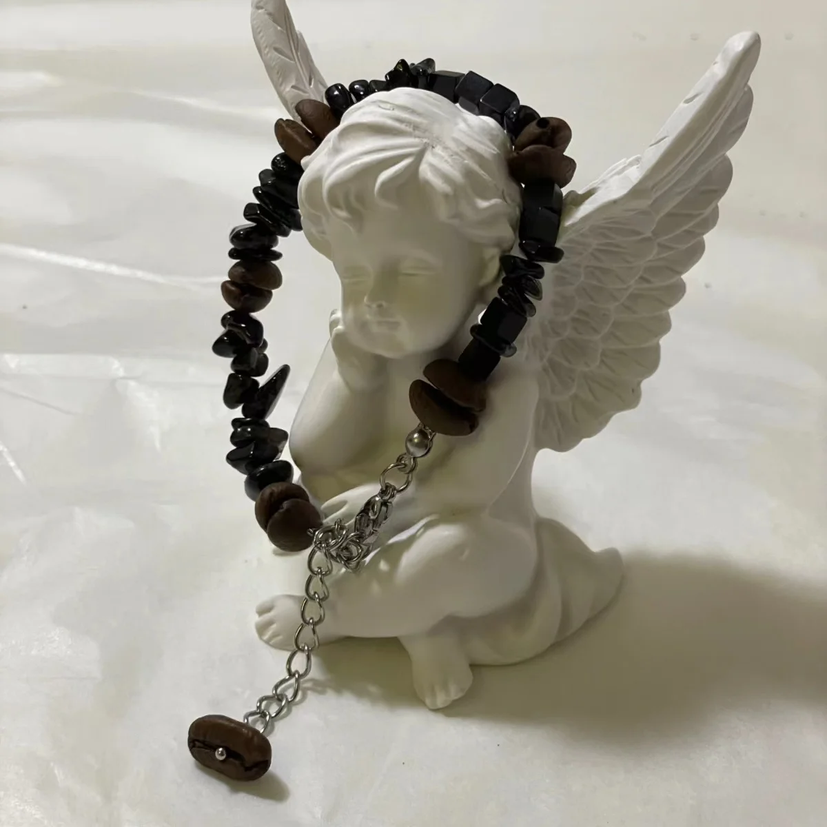 Coffee Bean & Black Stone Bracelet Image Coffee Bean & Black Stone Bracelet - Stylish Coffee Bean Accessory