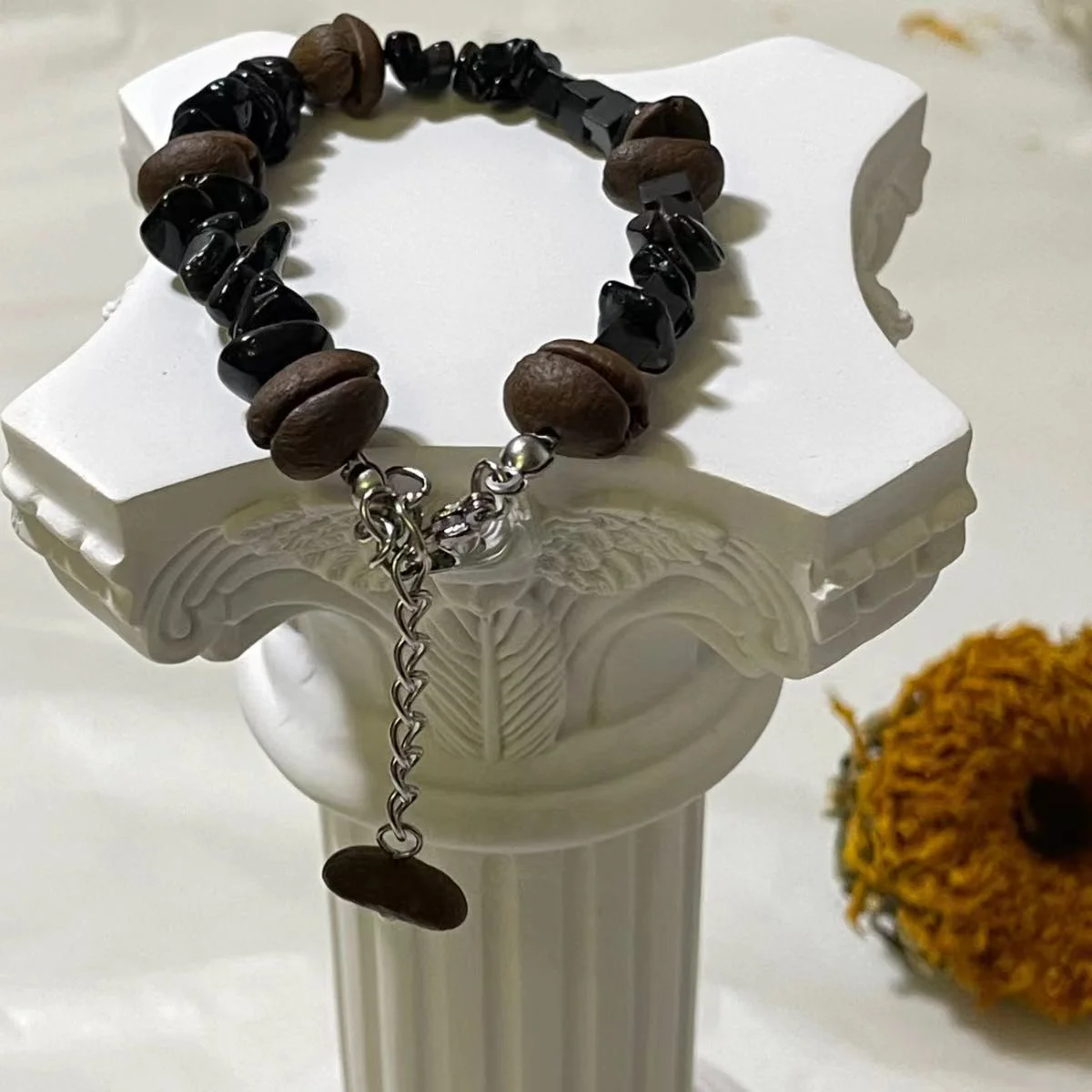 Coffee Bean & Black Stone Bracelet Image Coffee Bean & Black Stone Bracelet - Stylish Coffee Bean Accessory