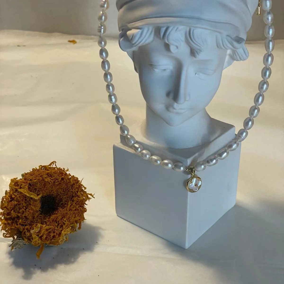 5mm Freshwater Pearl Necklace with Four-Leaf Clover Pendant Image 5mm Freshwater Pearl Necklace with Four-Leaf Clover Pendant