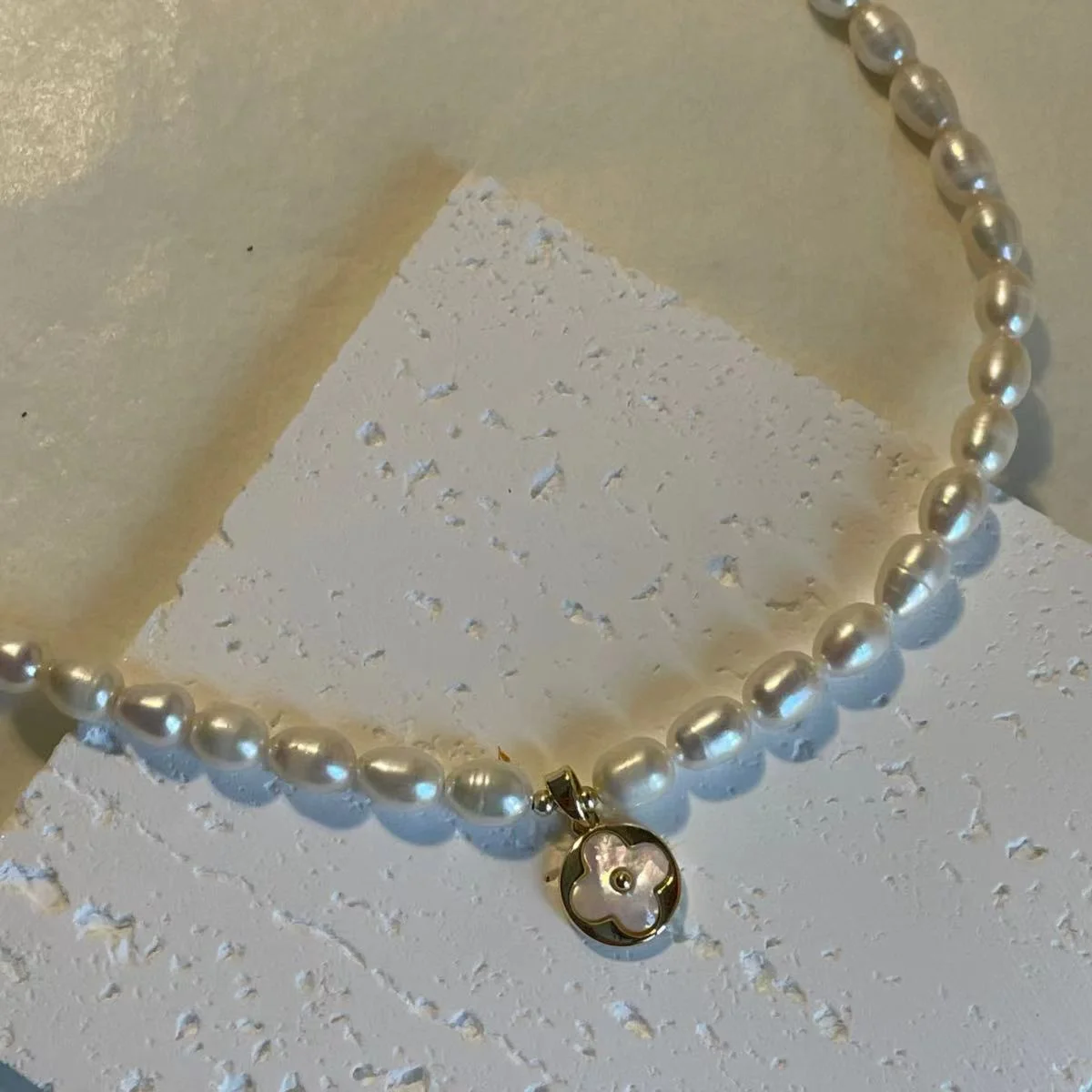 5mm Freshwater Pearl Necklace with Four-Leaf Clover Pendant Image 5mm Freshwater Pearl Necklace with Four-Leaf Clover Pendant