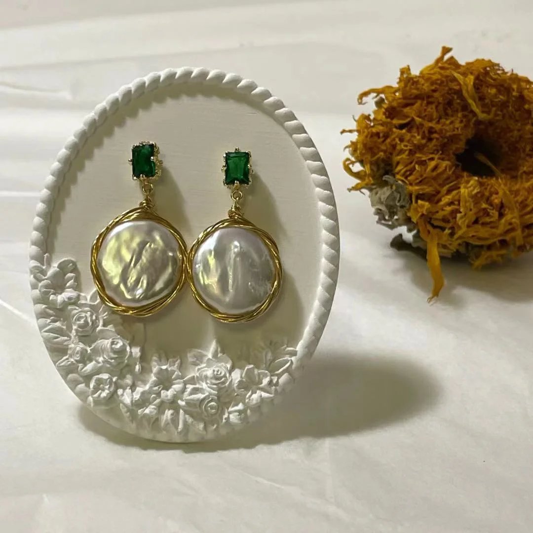 18K Gold Plated Freshwater Pearl Baroque Drop Earrings displayed with a dry sunflower in the background.