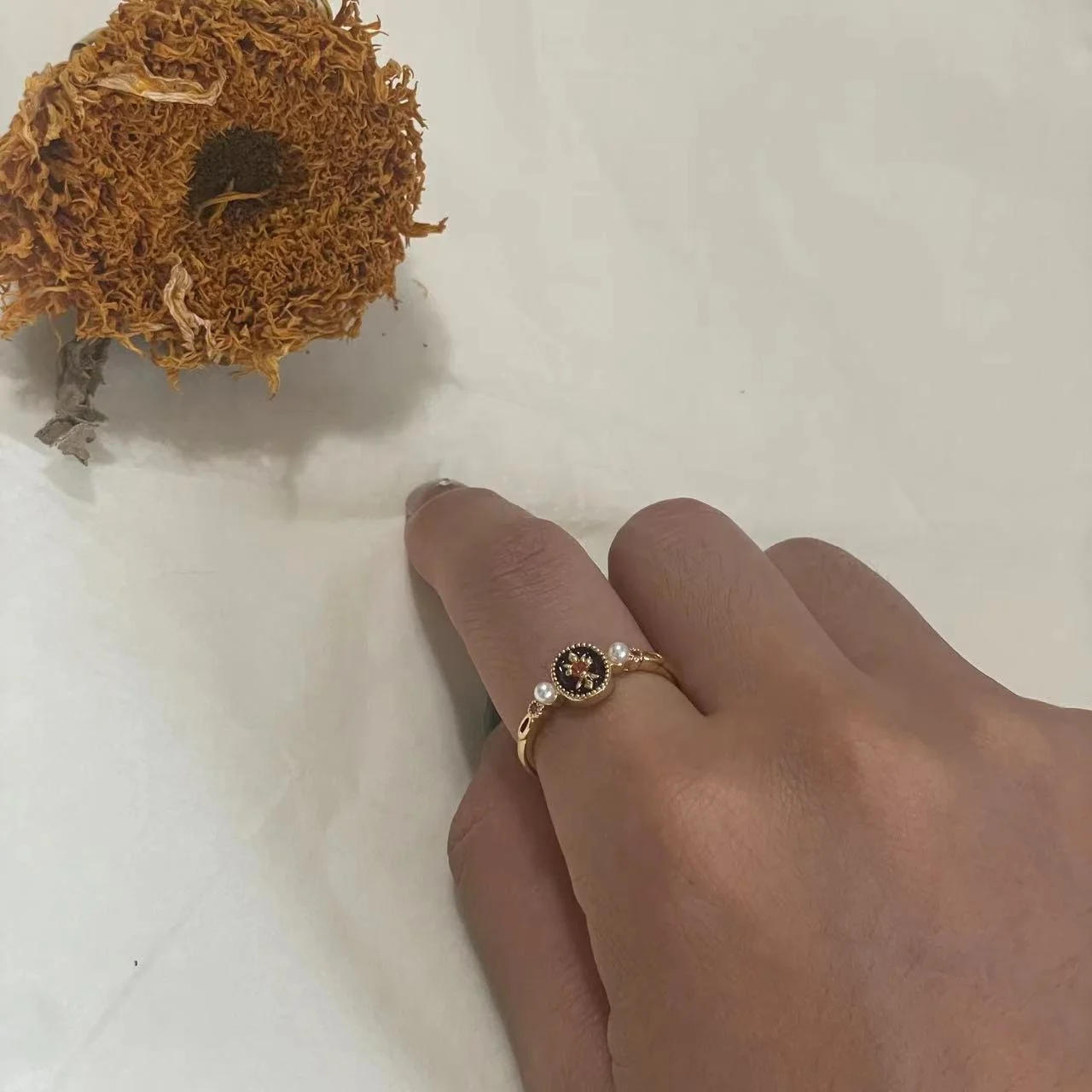 14K Vintage Black Iris Enamel Open Ring Worn on Hand with Sunflower 14K Vintage Black Iris Enamel Open Ring worn on hand with sunflower above