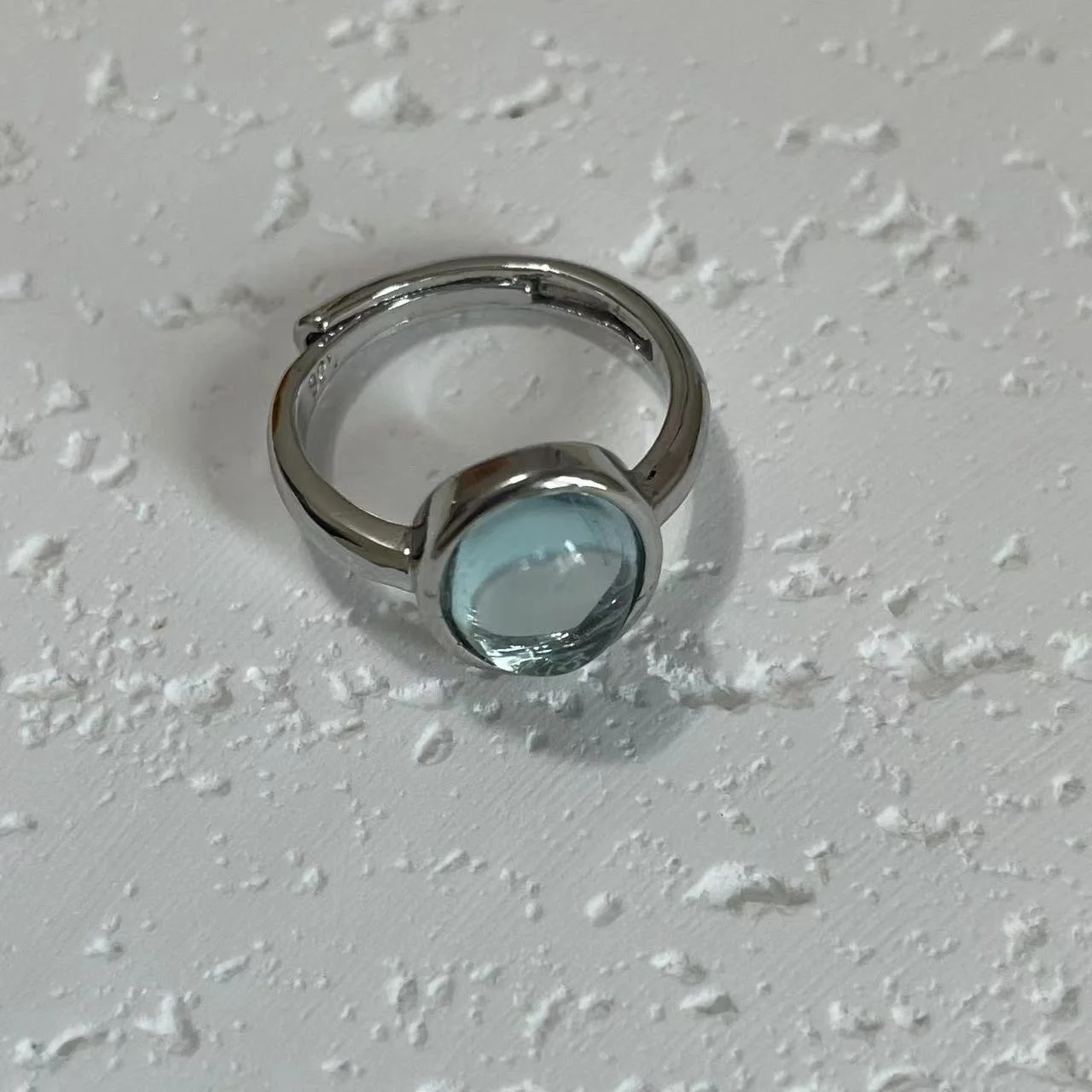 Aquamarine Silver-Plated Open Ring on white base