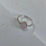 Strawberry Quartz Silver-Plated Open Ring tilted on white base