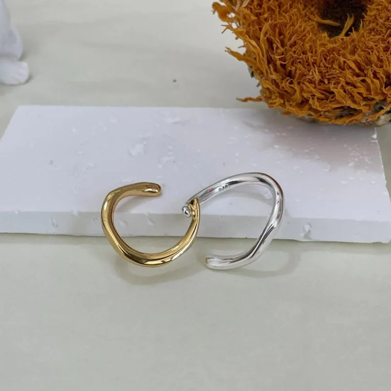 925 Sterling Silver Gold & Silver Dual Band Ring with dried sunflower on white base