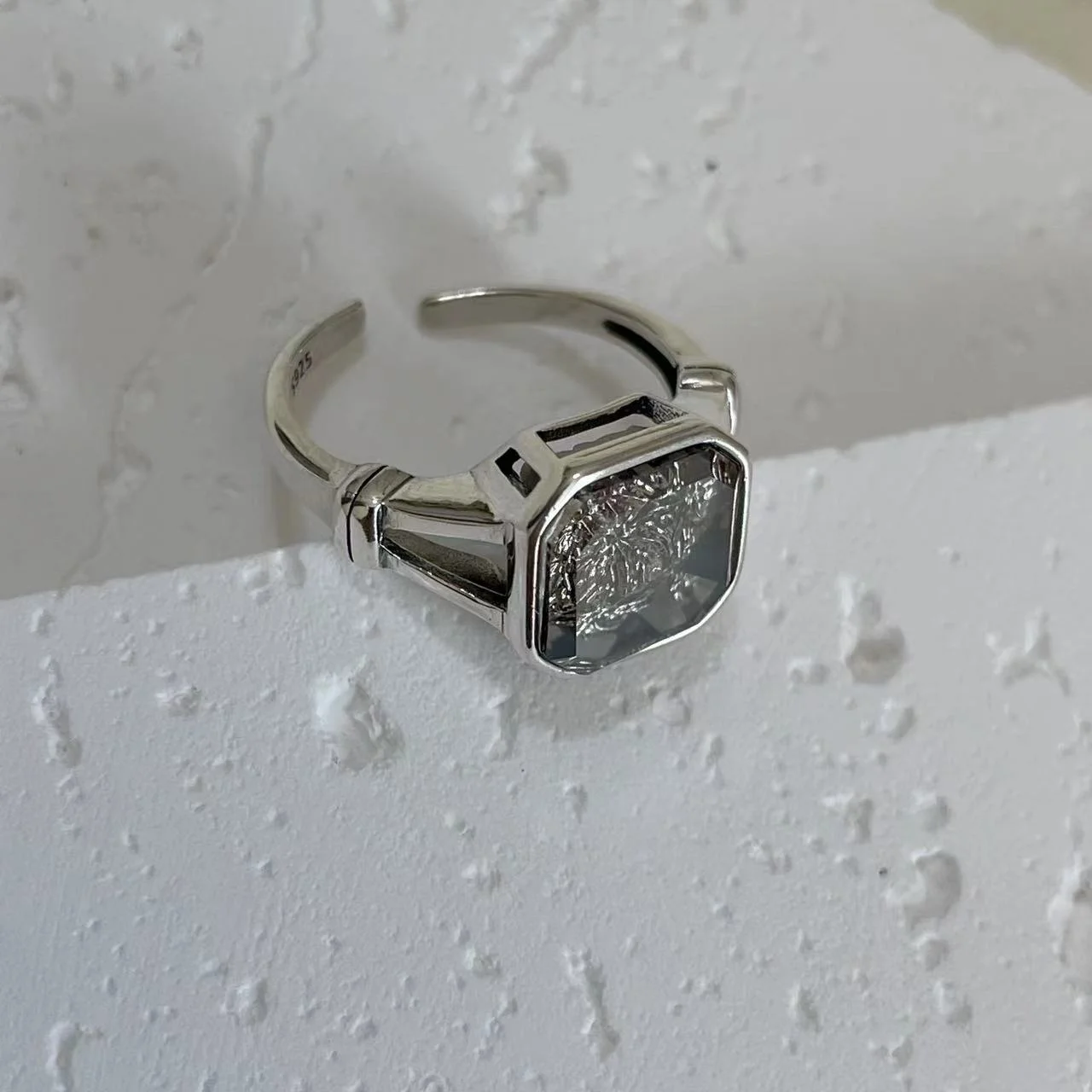 925 Sterling Silver White Topaz Ring flat on white base