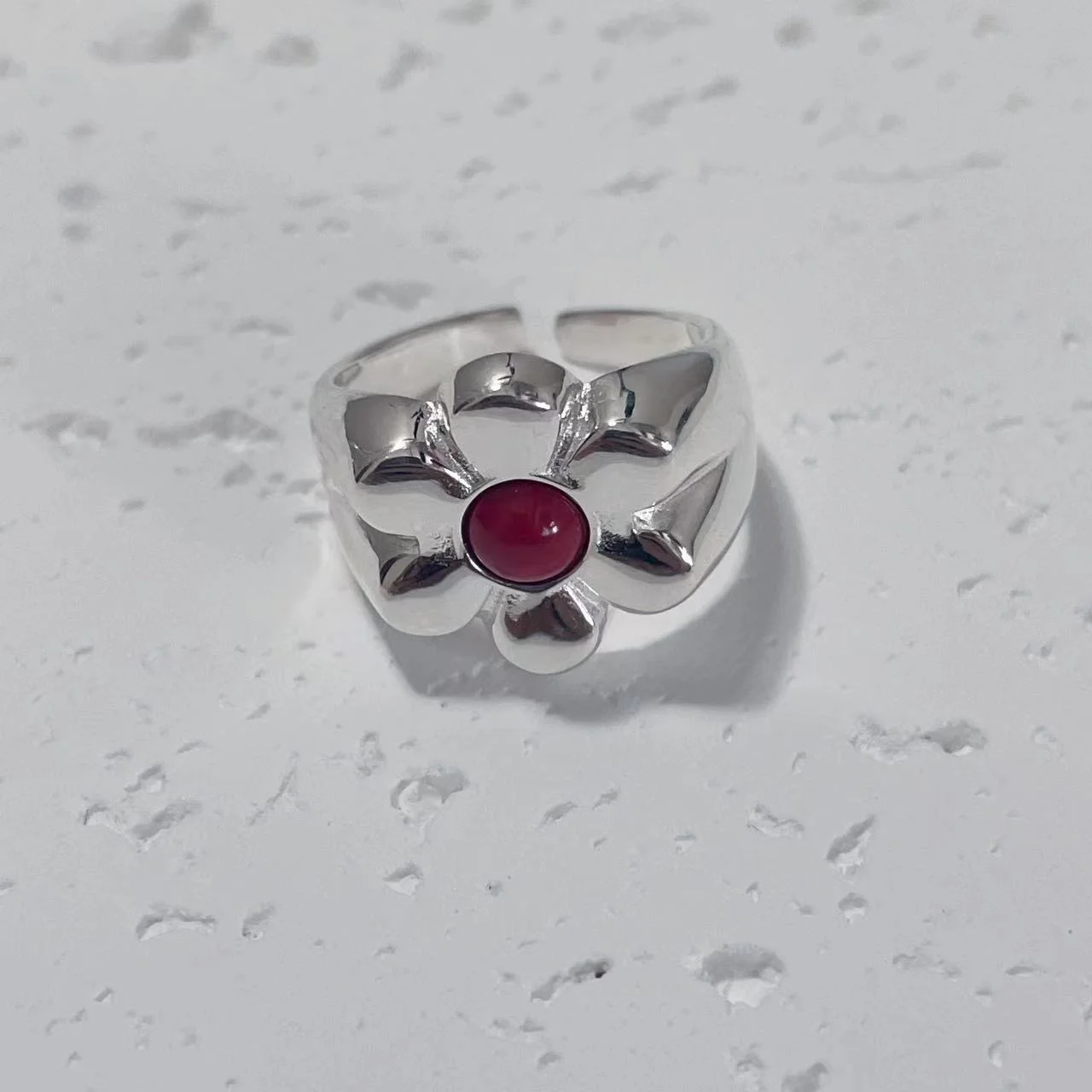 925 Sterling Silver Floral Ring with Red Natural Stone on White Plaster Board